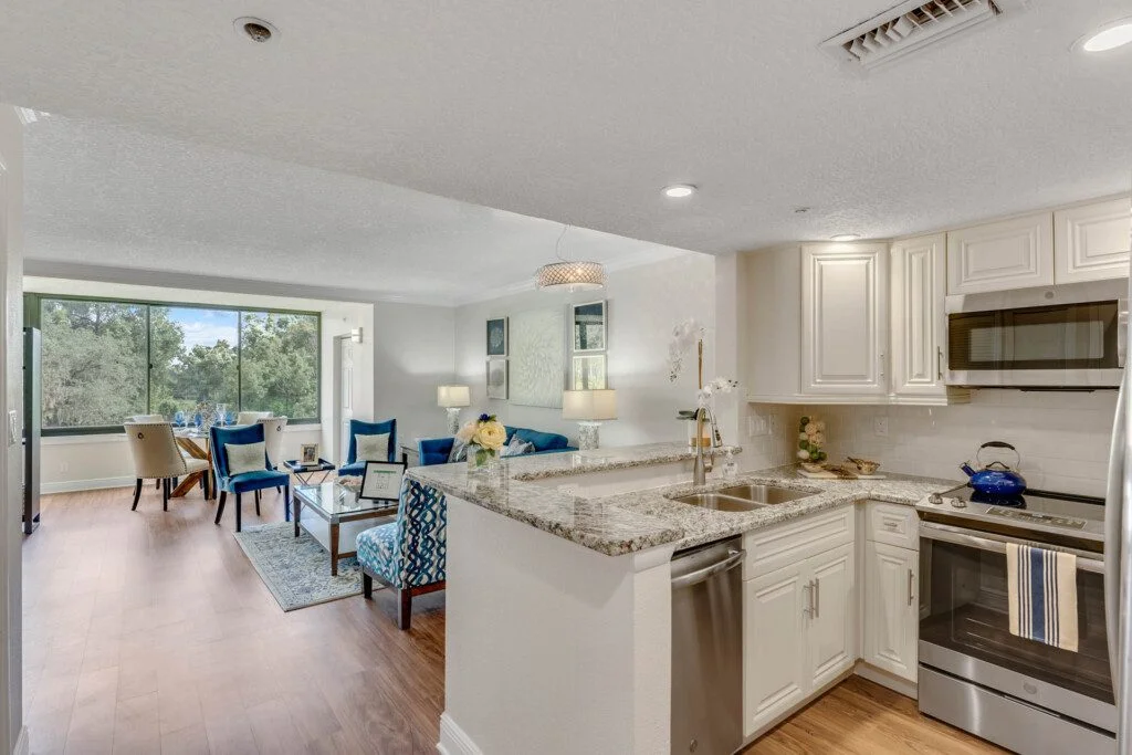 spacious open living area and kitchen of senior villa at Village on the Green