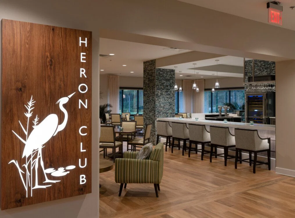 Heron Club lounge and bar at Village on the Green Senior Living Community