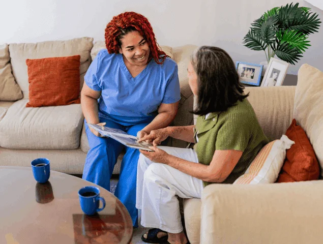 Memory Care specialist visiting with a resident