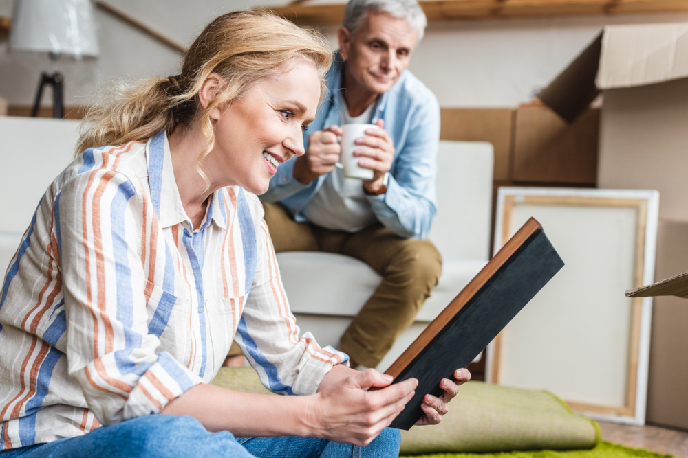 Senior couple looking through possessions 