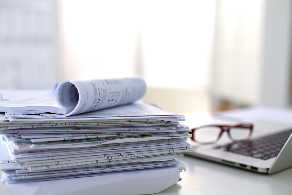 Stack of paperwork on a table