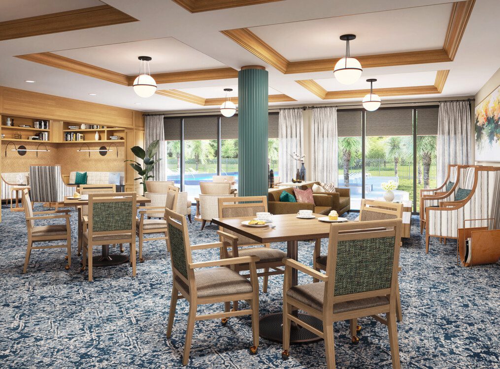 cozy informal dining space and lounge at Village on the Green Senior Living Community