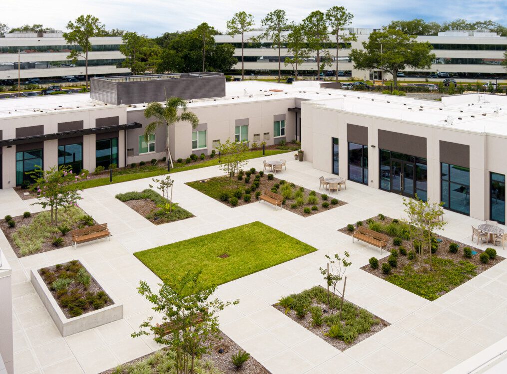 rendering of courtyard at Village on the Green Senior Living Community