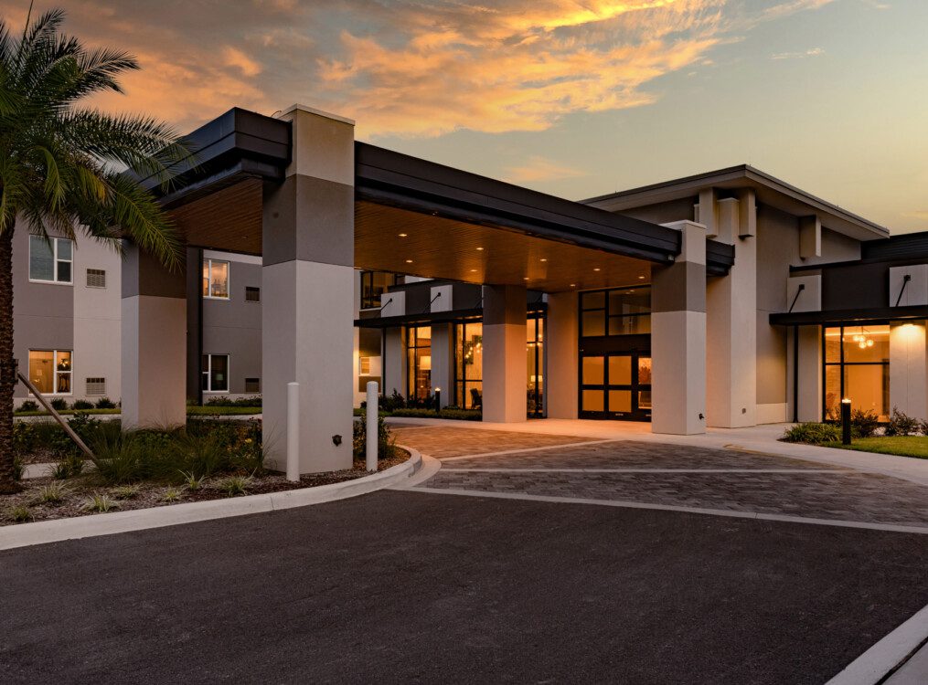 Entrance to Village on the Green Senior Living Community in Orlando, FL at night