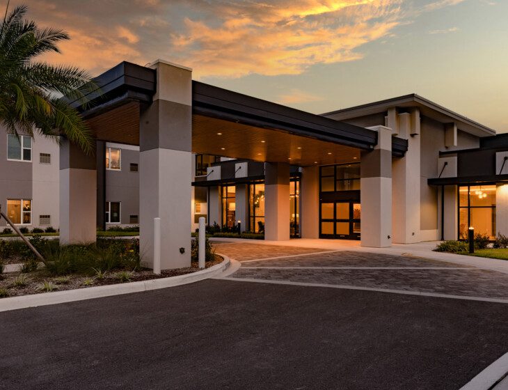 Entrance to Village on the Green Senior Living Community in Orlando, FL at night