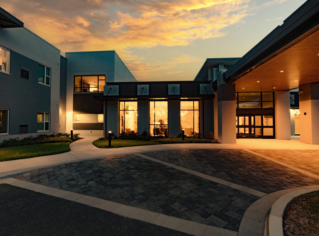 Entrance to Village on the Green Senior Living Community in Orlando, FL at night