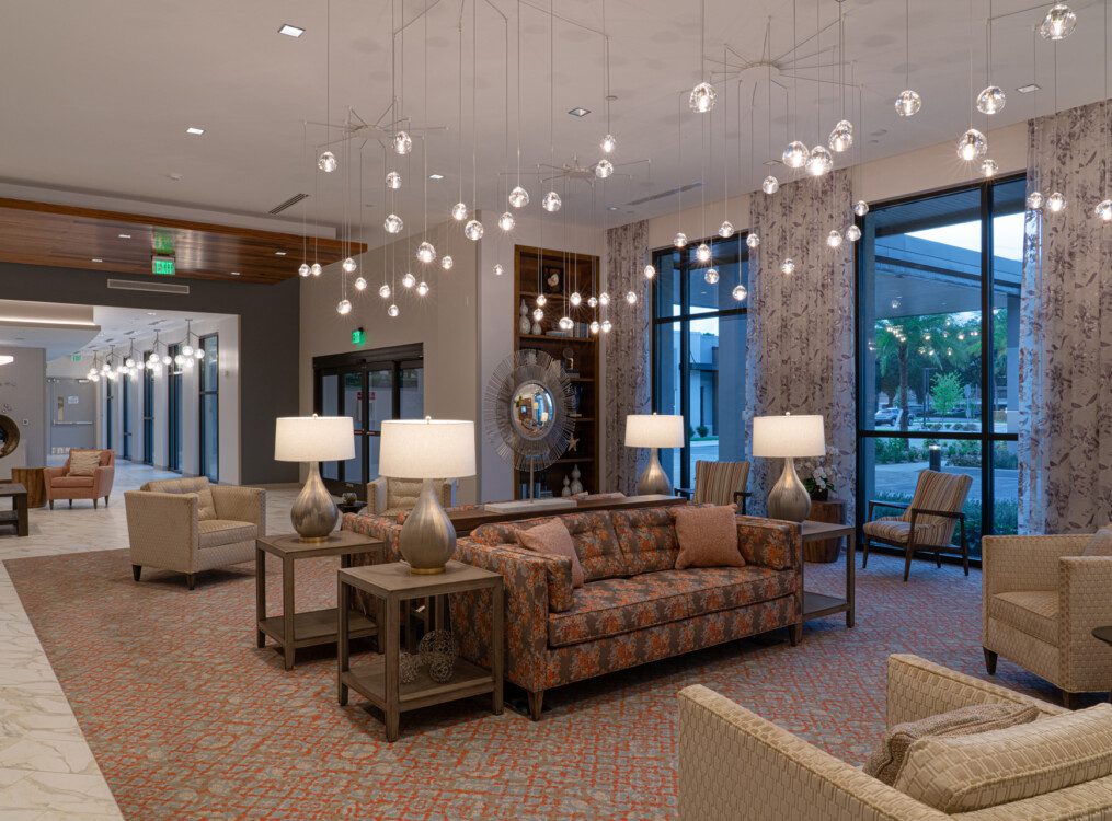 spacious interior lounge area at Village on the Green Senior Living Community