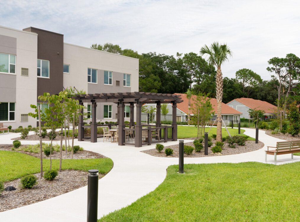 rendering of courtyard at Village on the Green Senior Living Community