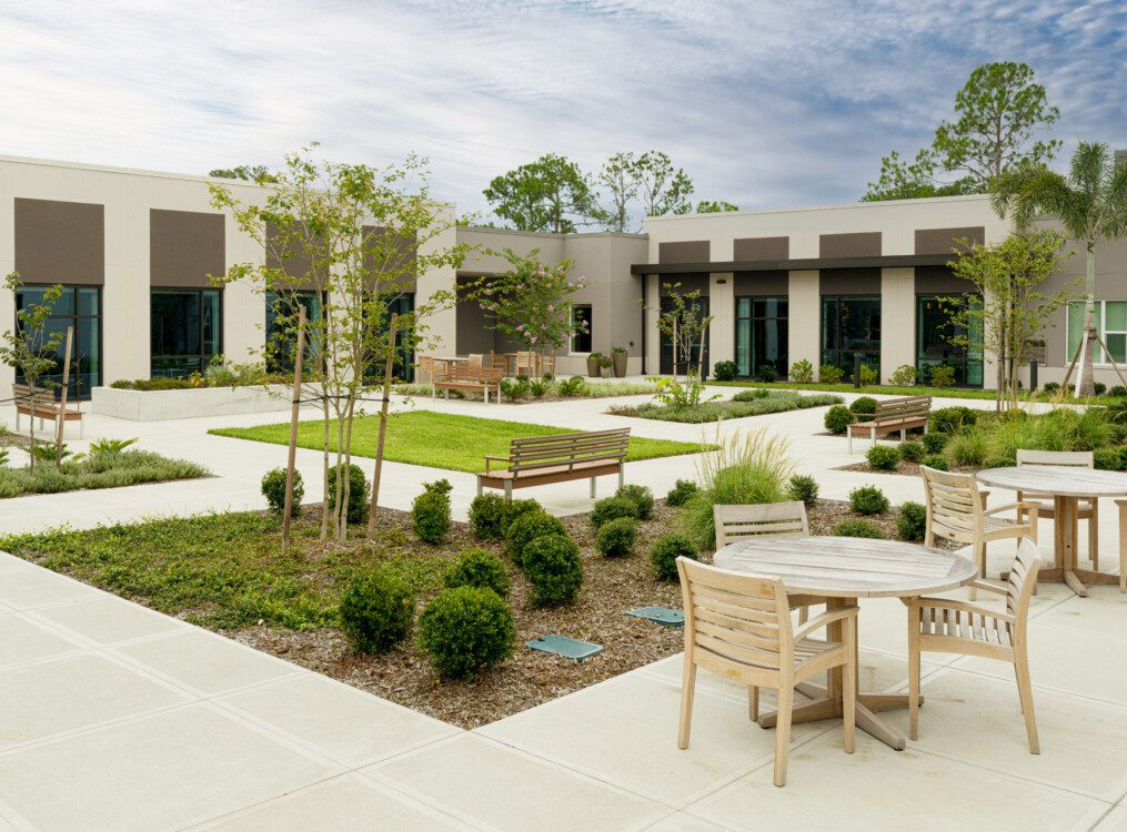 rendering of courtyard at Village on the Green Senior Living Community