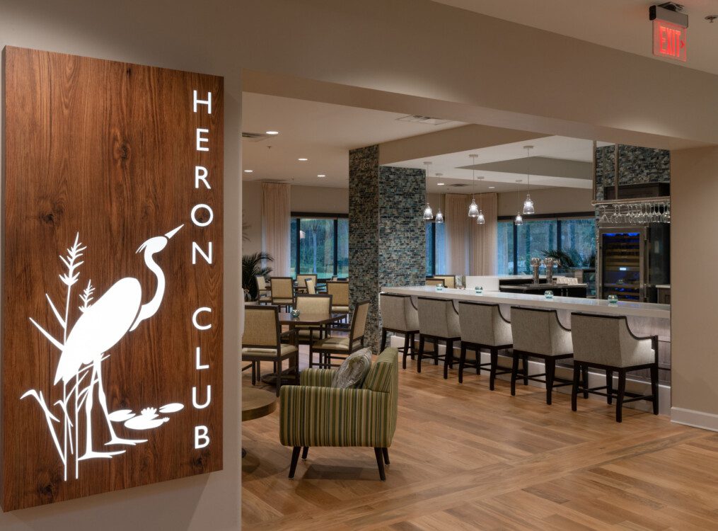 "Heron Club" lounge and bar at Village on the Green Senior Living Community